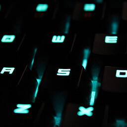 A gaming laptop with lit keys.