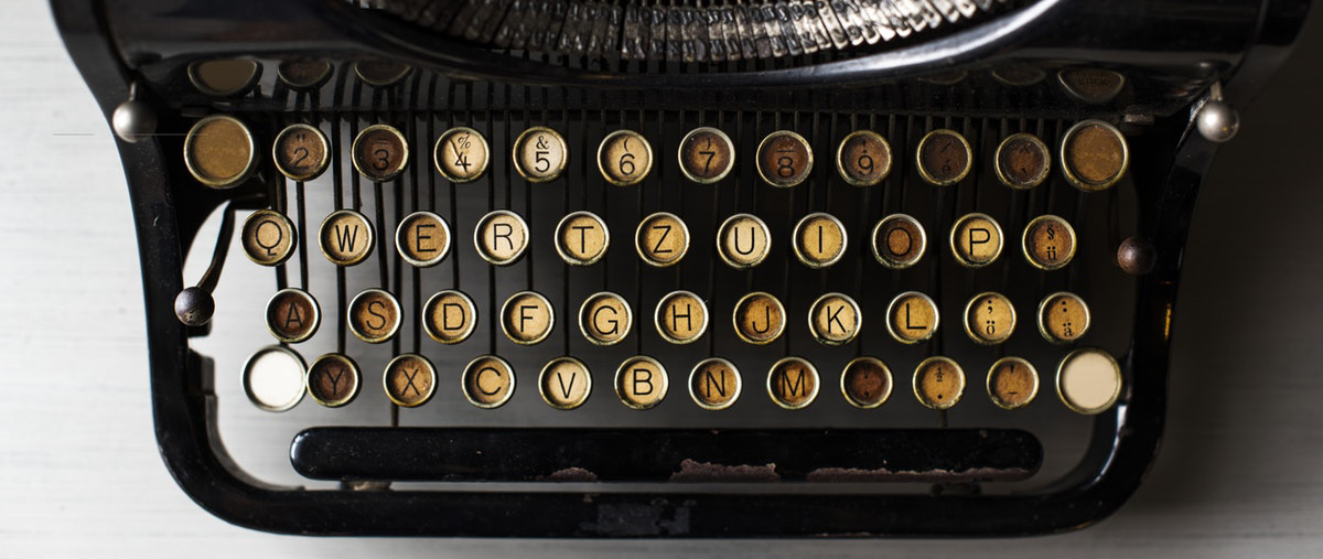 A typewriter ready to write.